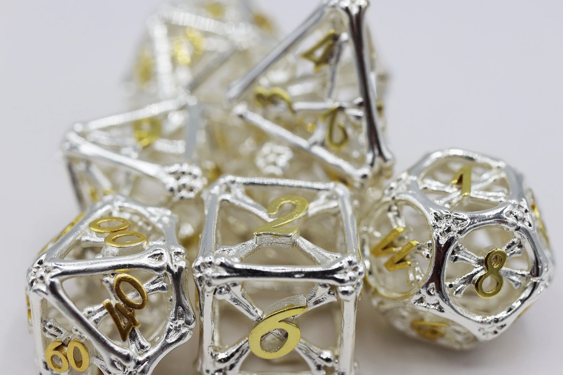 Hollow Holy Bones RPG Metal Dice Set | Game Grid - Logan