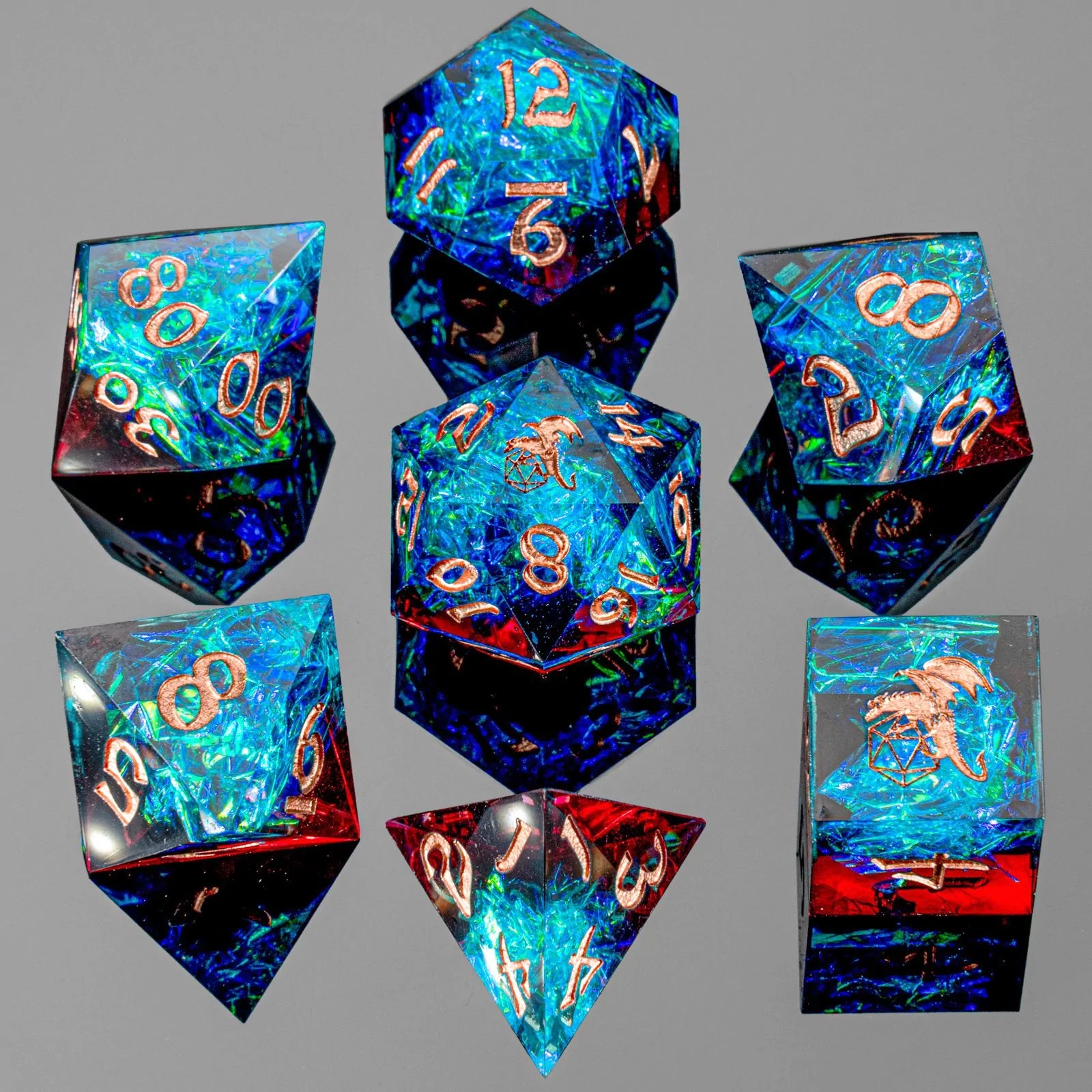 Captured Magic Sharp Edge Resin Dice: Blue and Red | Game Grid - Logan