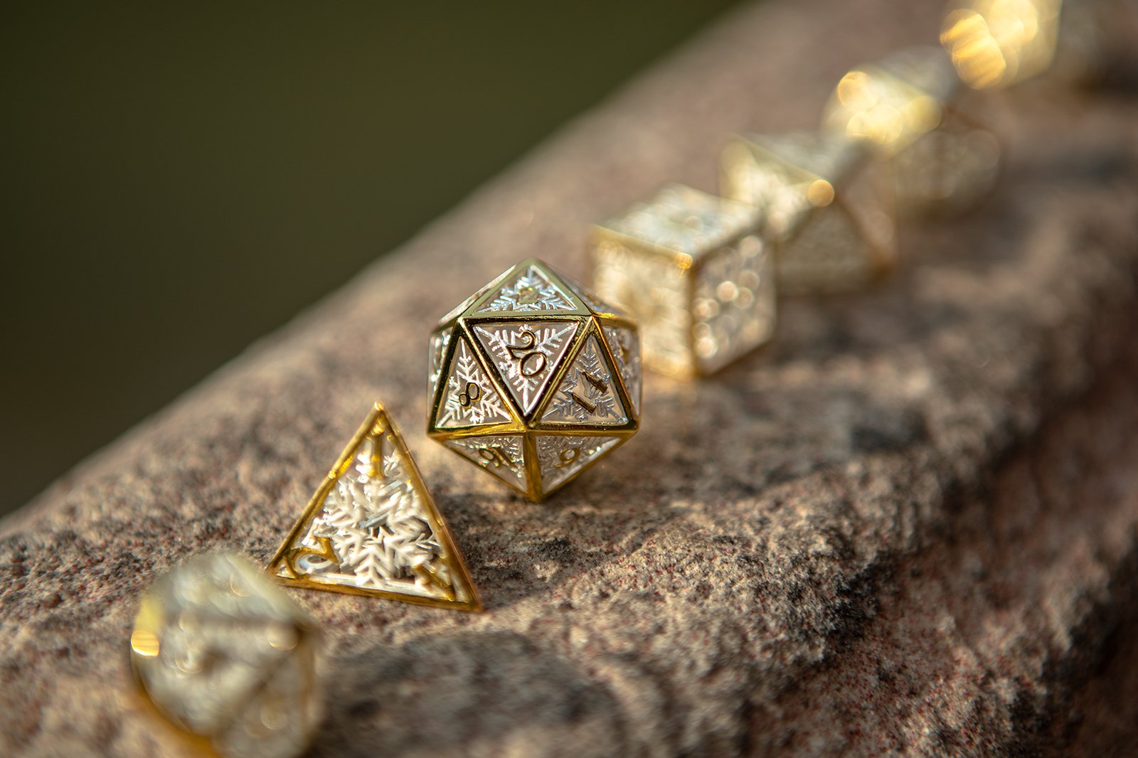 Hollow Snowflake Dice: Gold | Game Grid - Logan